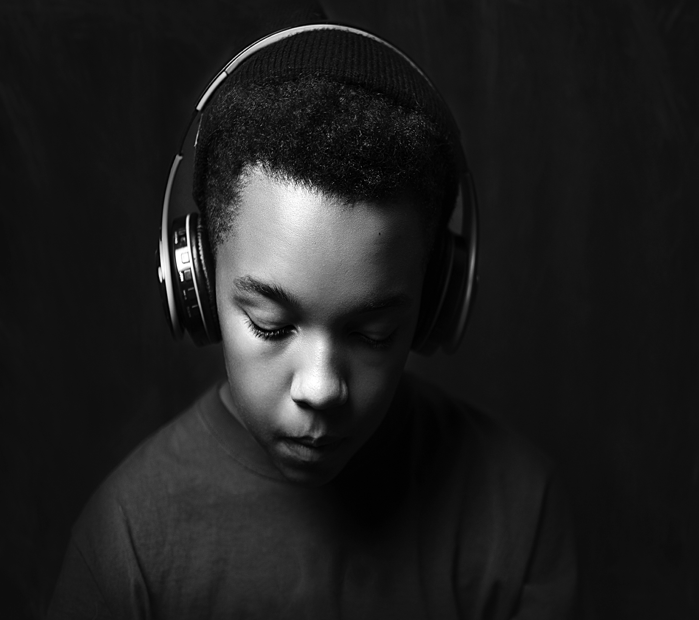 Young person wearing headphones for the 360 Academy program